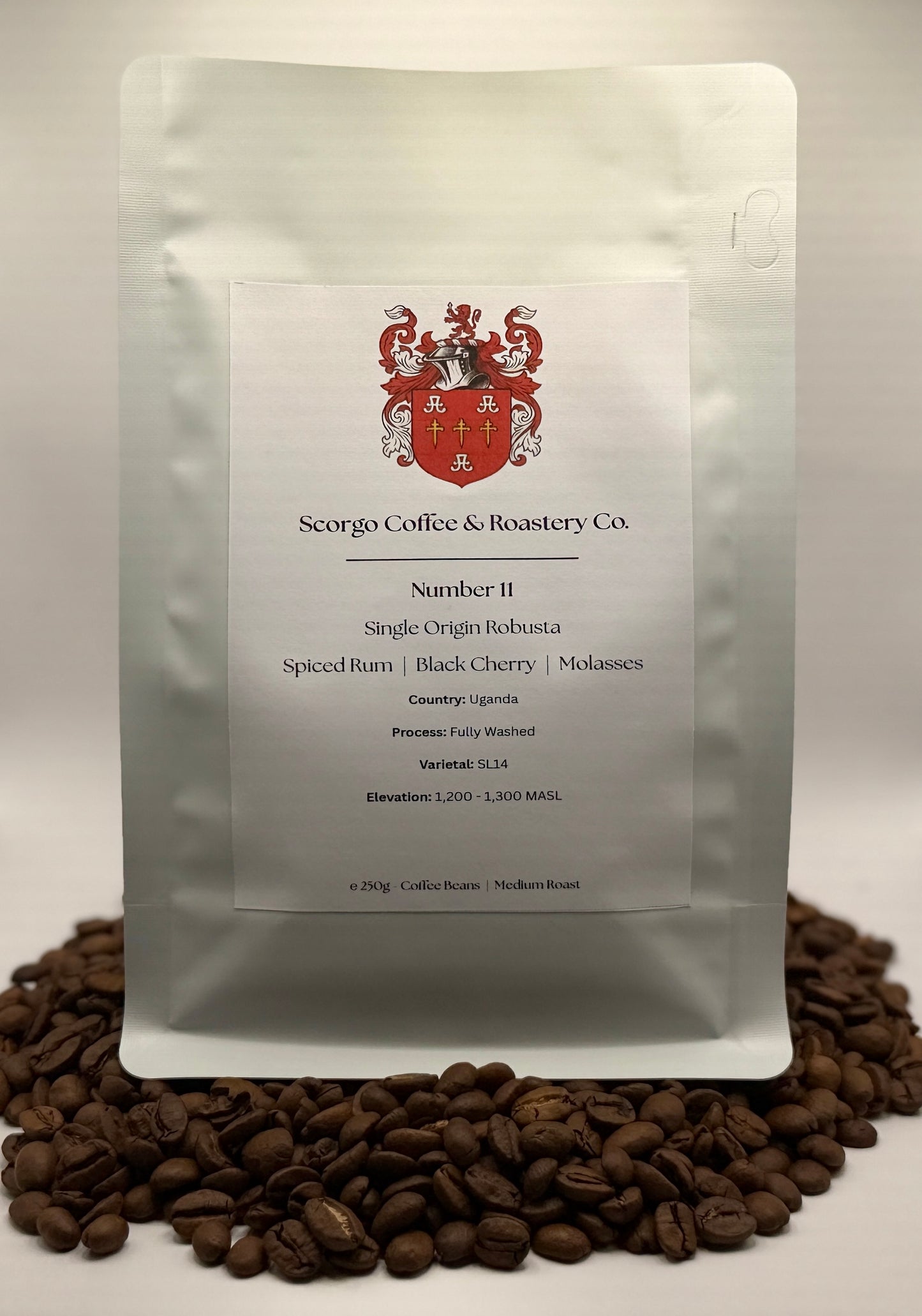 Scorgo coffee Number 11 single origin robusta ground coffee from uganda. Flavour notes include spiced rum, black cherry and molasses. Fully washed coffee from a UK-based family run coffee roastery.