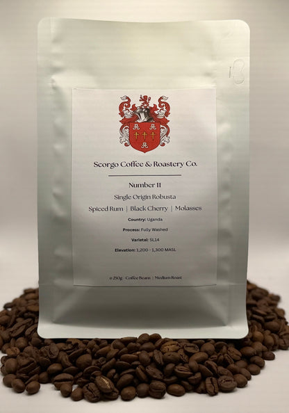 Scorgo coffee Number 11 single origin robusta ground coffee from uganda. Flavour notes include spiced rum, black cherry and molasses. Fully washed coffee from a UK-based family run coffee roastery.