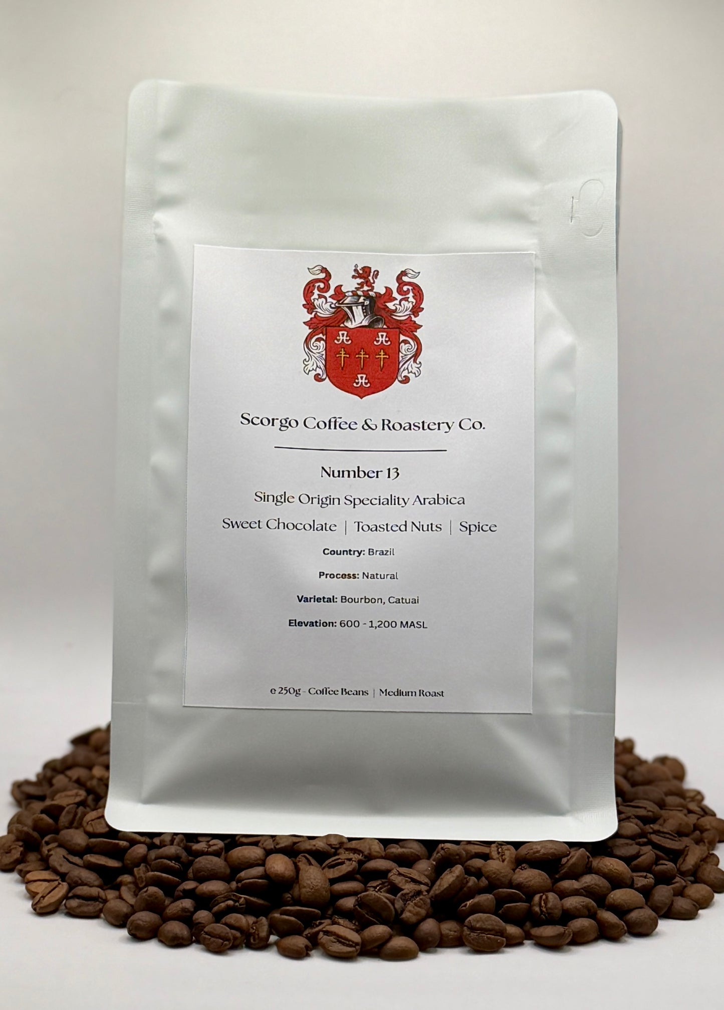 Scorgo coffee Number 13 single origin arabica ground coffee from Brazil. Flavour notes include sweet chocolate, toasted nuts and spice. Naturally processed specialty coffee from a UK-based family run coffee roastery.