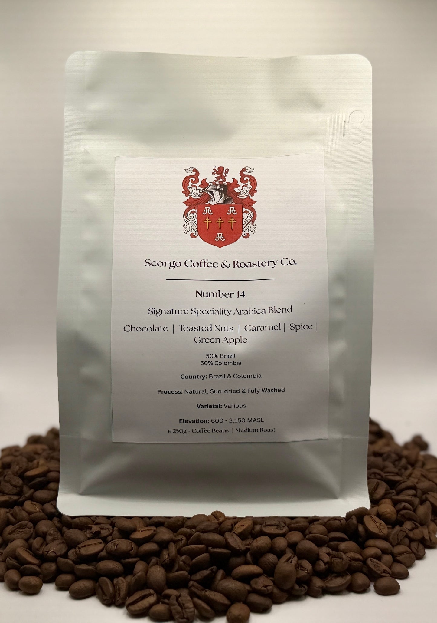 Scorgo coffee Number 14 arabica blend ground coffee from Brazil and Colombia. Flavour notes include chocolate, toasted nuts, caramel, spice and green apple. Natural, sun-dried and fully washed specialty coffee from a UK-based family run roastery.