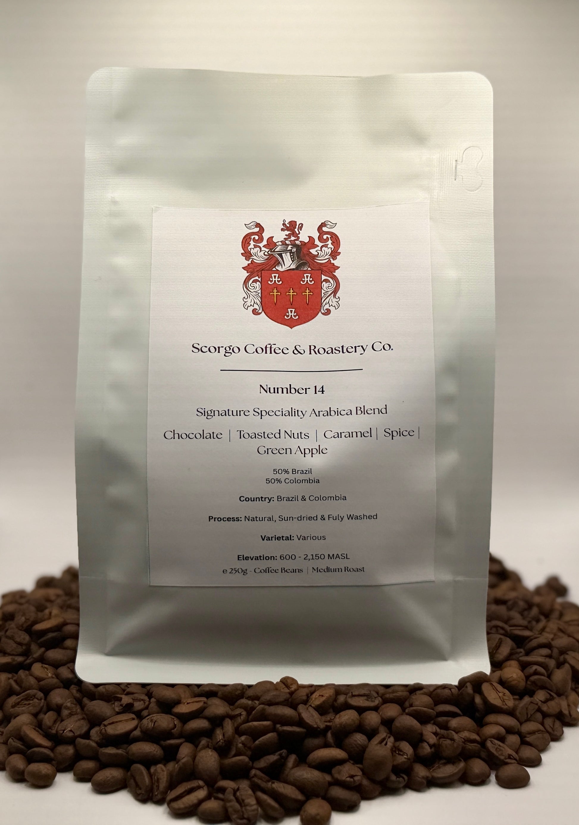 Scorgo coffee Number 14 arabica blend ground coffee from Brazil and Colombia. Flavour notes include chocolate, toasted nuts, caramel, spice and green apple. Natural, sun-dried and fully washed specialty coffee from a UK-based family run roastery.