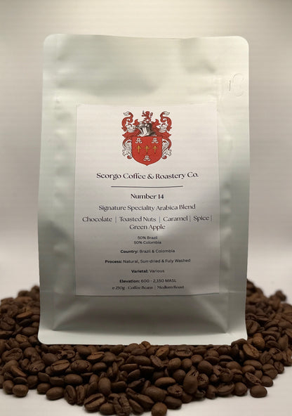 Scorgo coffee Number 14 arabica blend ground coffee from Brazil and Colombia. Flavour notes include chocolate, toasted nuts, caramel, spice and green apple. Natural, sun-dried and fully washed specialty coffee from a UK-based family run roastery.