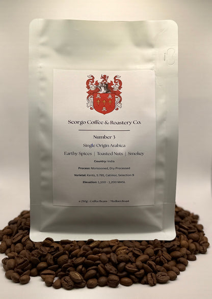 Scorgo coffee Number 3 single origin arabica ground coffee from India. Flavour notes include earthy spices, toasted nuts and smokey. Monsooned dry processed coffee from a UK-based family run coffee roastery