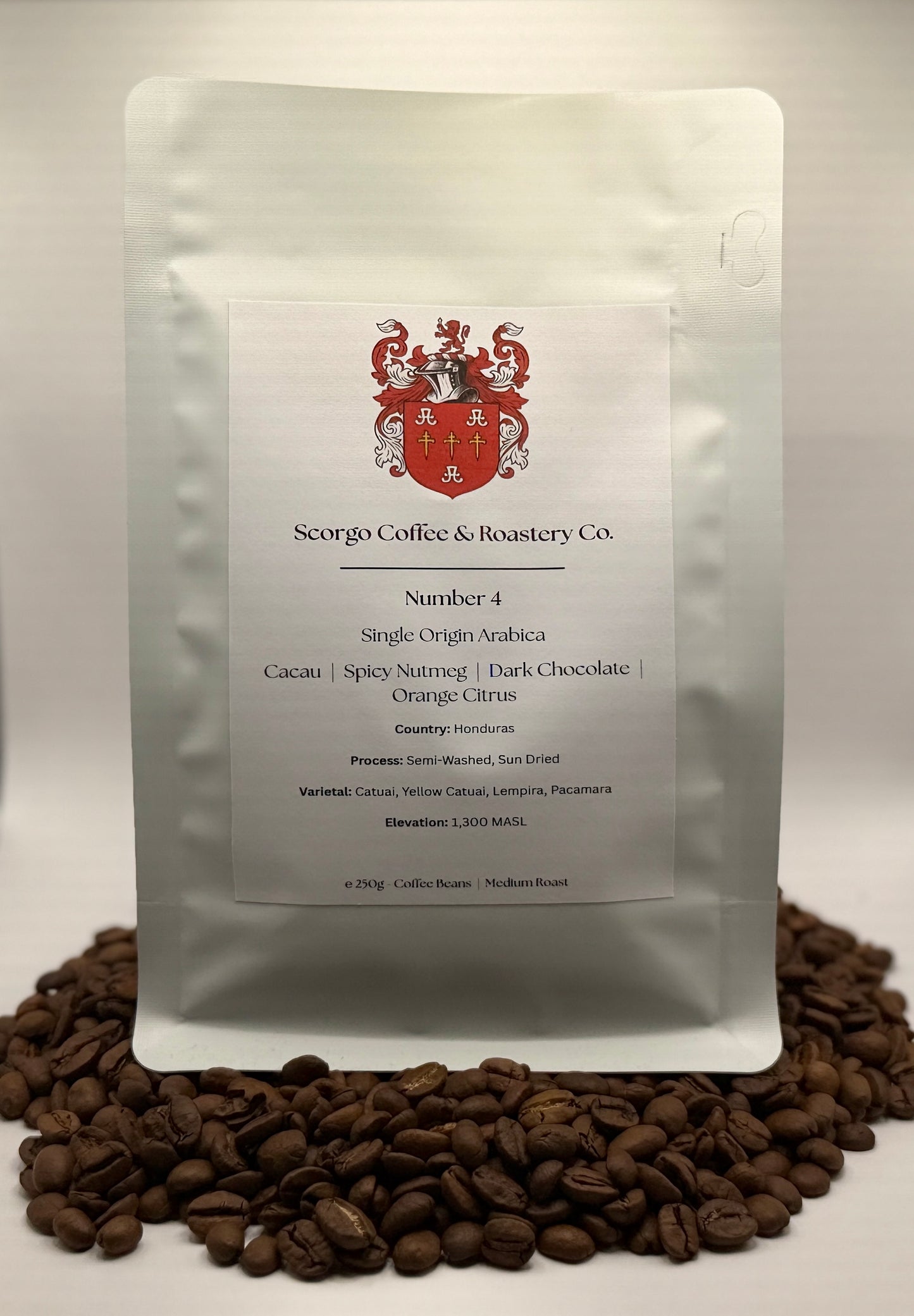 Scorgo coffee Number 4 single origin arabica ground coffee from Honduras. Flavour notes include cacau, spicy nutmeg, dark chocolate and orange citrus. Semi-washed sun-dried coffee from a UK-based family run roastery.