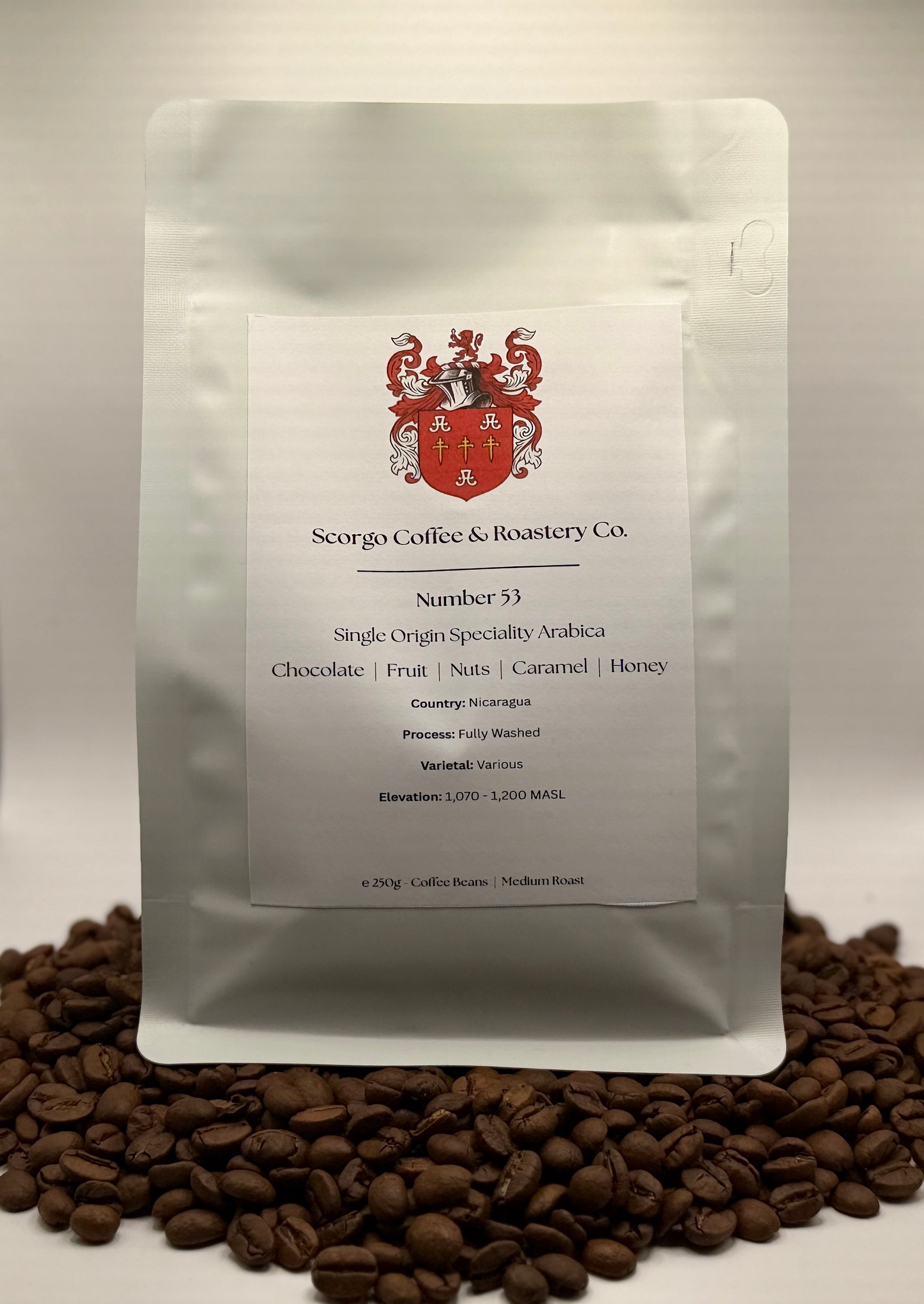 Scorgo coffee Number 53 single origin arabica ground coffee from Nicaragua. Flavour notes include chocolate, fruit, nuts, caramel and honey. Fully washed specialty coffee from a UK-based family run coffee roastery.