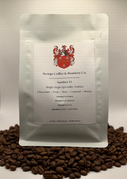 Scorgo coffee Number 53 single origin arabica ground coffee from Nicaragua. Flavour notes include chocolate, fruit, nuts, caramel and honey. Fully washed specialty coffee from a UK-based family run coffee roastery.