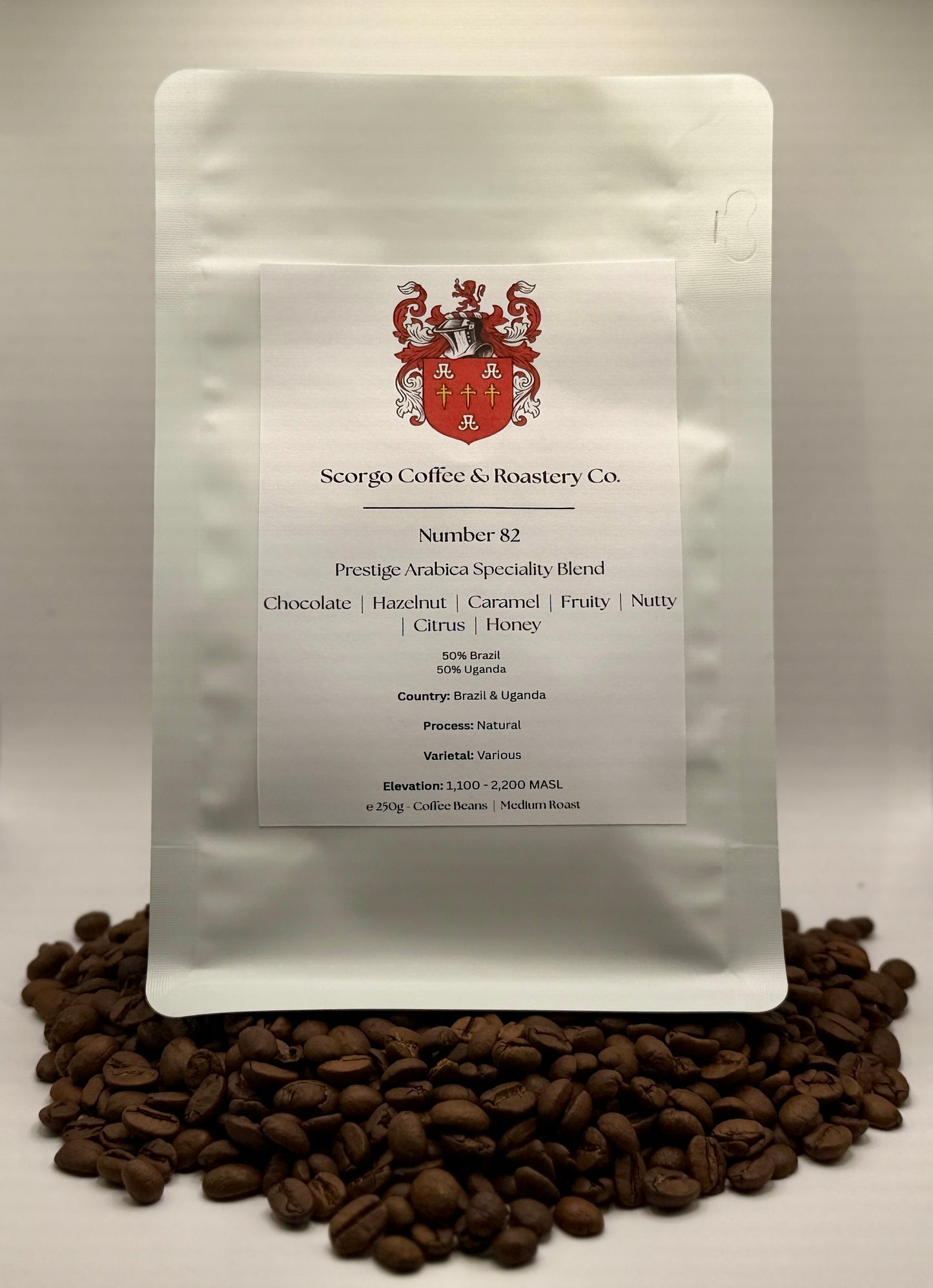 Scorgo coffee Number 82 specialty blend arabica ground coffee from Brazil and Uganda. Flavour notes include chocolate, hazelnut, caramel, fruity, nutty, citrus and honey. Naturally processed coffee from a UK-based family run coffee roastery.