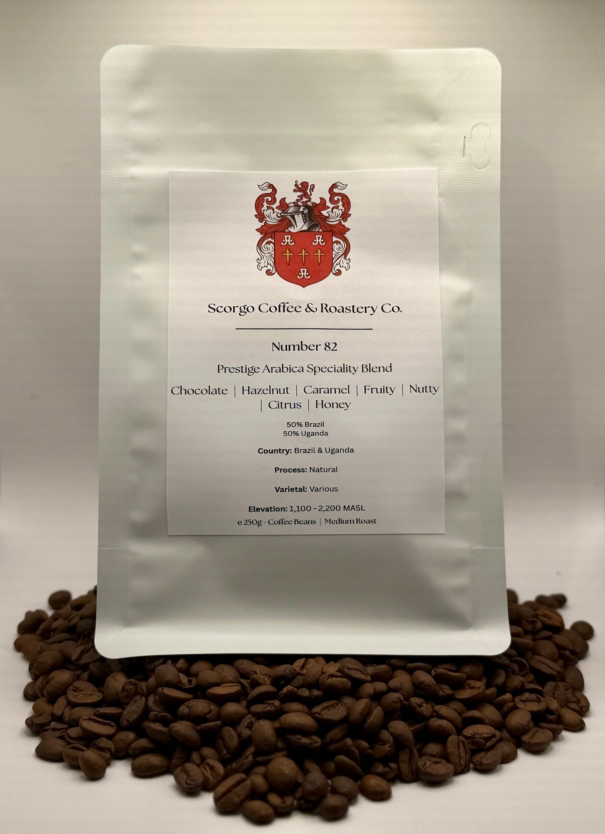 Scorgo coffee Number 82 specialty blend arabica ground coffee from Brazil and Uganda. Flavour notes include chocolate, hazelnut, caramel, fruity, nutty, citrus and honey. Naturally processed coffee from a UK-based family run coffee roastery.