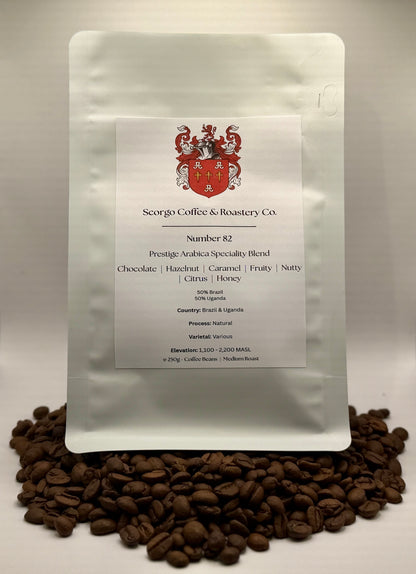 Scorgo coffee Number 82 specialty blend arabica ground coffee from Brazil and Uganda. Flavour notes include chocolate, hazelnut, caramel, fruity, nutty, citrus and honey. Naturally processed coffee from a UK-based family run coffee roastery.