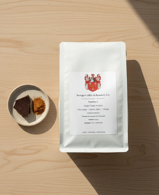 Scorgo Coffee & Roastery Co. Specialty coffee roasters in the UK. Scorgo Number 5. Chocolate, Earthy Spice, Musky.